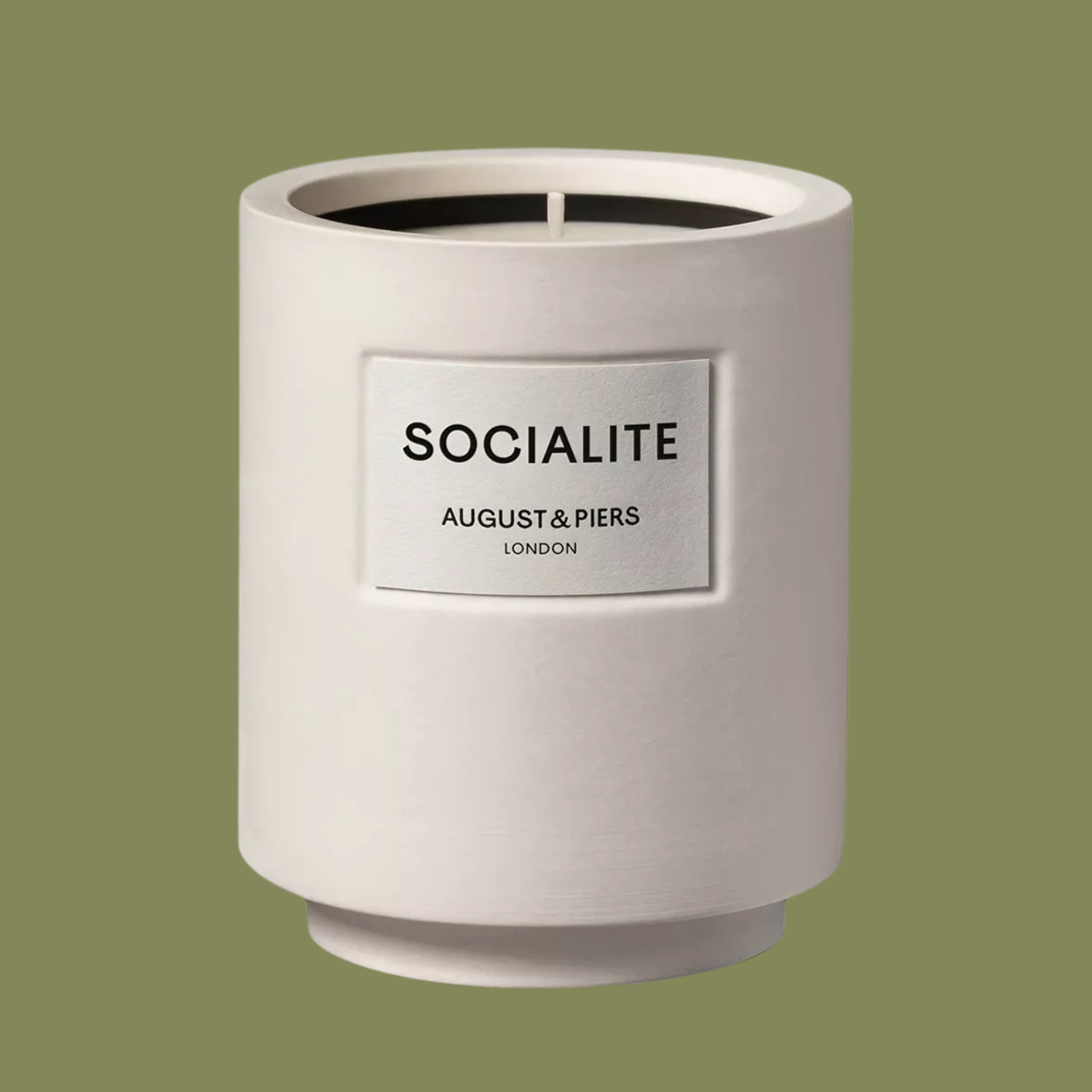 A candle in a ceramic vessel