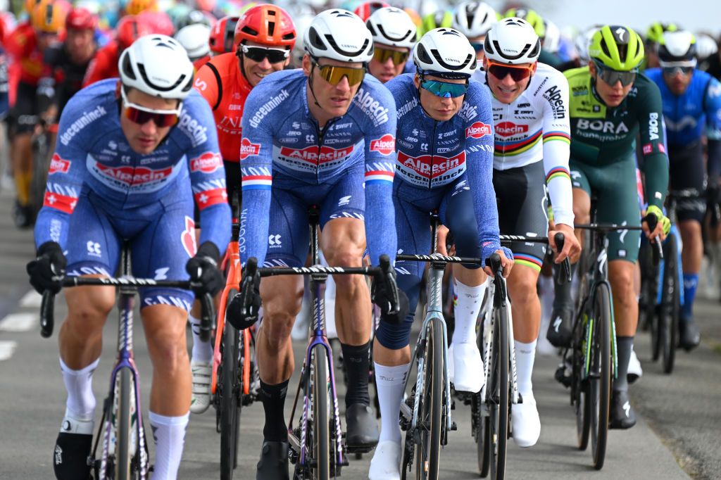 WEVELGEM BELGIUM MARCH 24 LR Jasper Philipsen of Belgium and Mathieu van der Poel of The Netherlands and Team Alpecin Deceuninck compete during the 86th GentWevelgem in Flanders Fields 2024 Mens Elite a 2531km one day race from Ieper to Wevelgem UCIWT on March 24 2024 in Wevelgem Belgium Photo by Tim de WaeleGetty Images