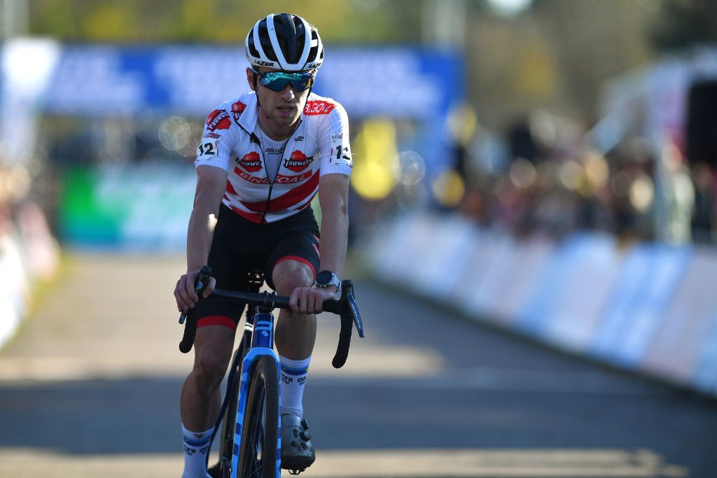 ZONHOVEN BELGIUM OCTOBER 24 Eli Iserbyt of Belgium and Team Pauwels Sauzen Bingoal crosses the finishing line during the 25th Zonhoven UCI CycloCross Worldcup 2021 Mens Elite CXWorldCup UCIcyclocrossWC zonhoven on October 24 2021 in Zonhoven Belgium Photo by Luc ClaessenGetty Images