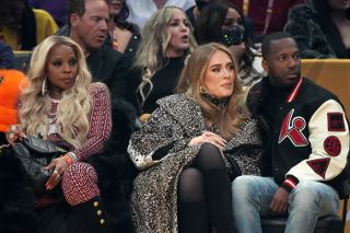 Mary J. Blige, Adele, and Rich Paul attend the 2022 NBA All-Star Game at Rocket Mortgage Fieldhouse on February 20, 2022 in Cleveland, Ohio