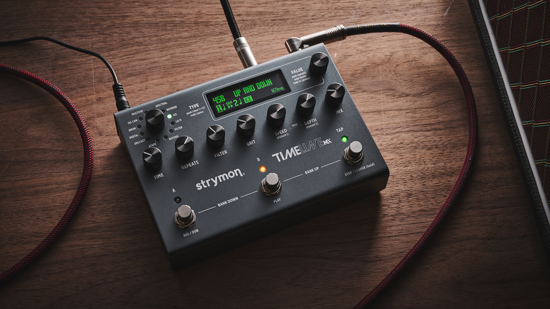 A Strymon TimeLine MX delay pedal on a wooden floor