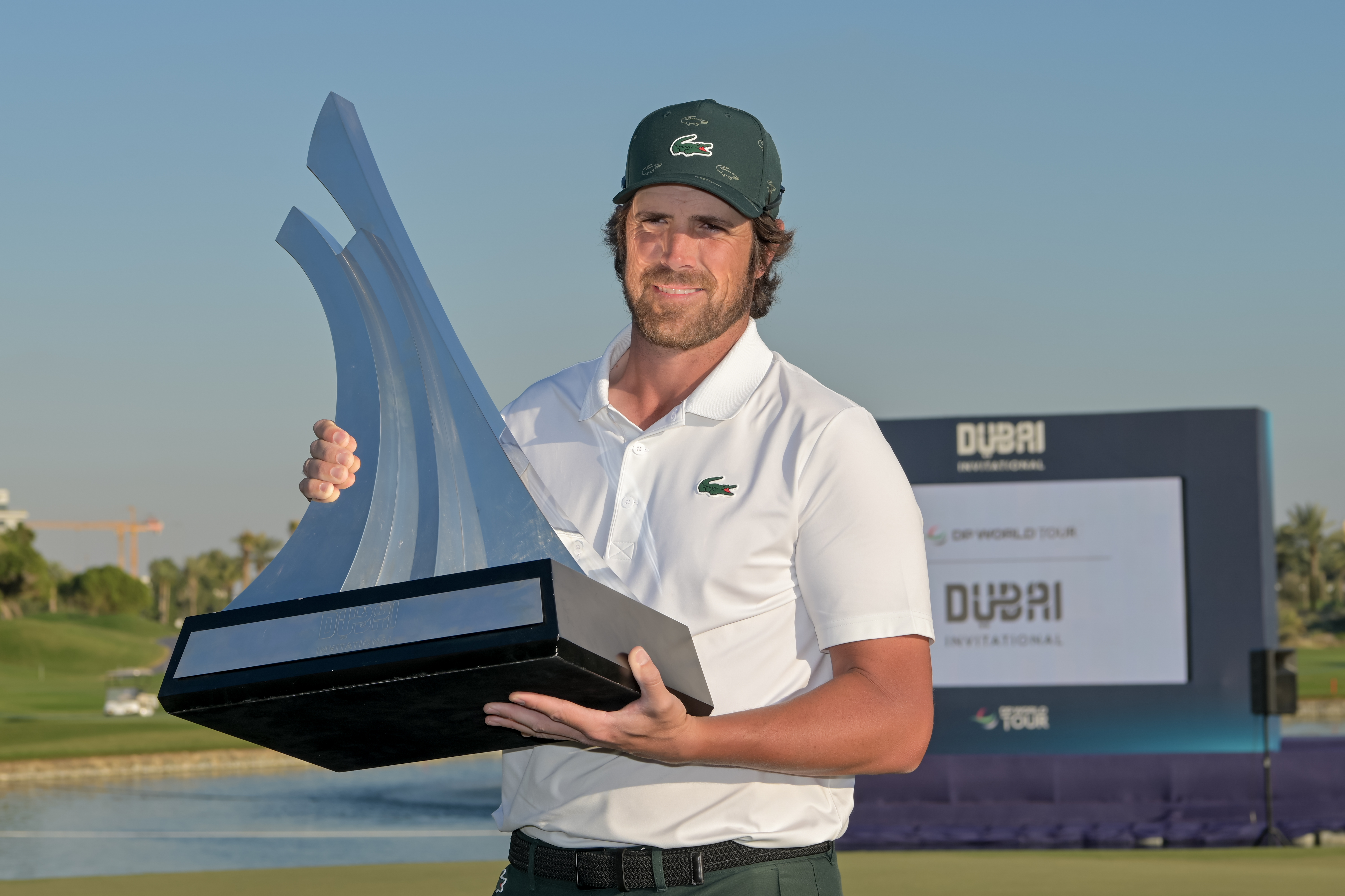 Nacho Elvira holds the Dubai Invitational trophy