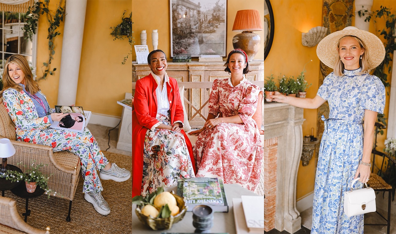 Women in floral outfits posing on the Country Life 2025 Chelsea Flower Show stand