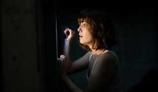 10 Cloverfield Lane Michelle peeks outside carefully