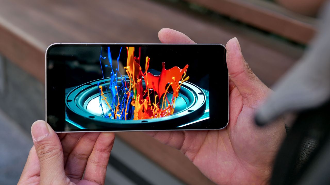 Samsung Galaxy S24 FE held in the hand.