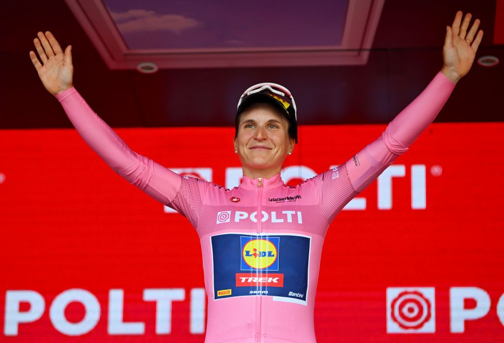 BRESCIA ITALY JULY 07 Elisa Longo Borghini of Italy and Team Lidl Trek celebrates at podium as Pink Leader Jersey winner during the 35th Giro dItalia Women 2024 Stage 1 a 157km individual time trial stage from Brescia to Brescia UCIWWT on July 07 2024 in Brescia Italy Photo by Luc ClaessenGetty Images