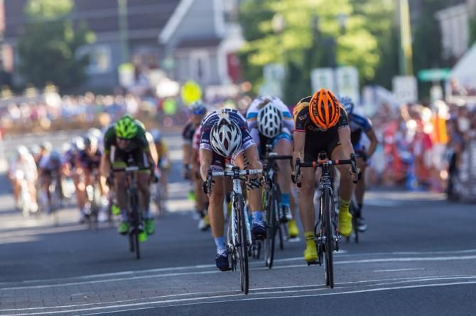 Lauren Hall (Optum) barely nips Shelly Olds (TIBCO) at the line.