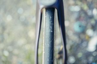 A close up of a black bike tyre as viewed from above.