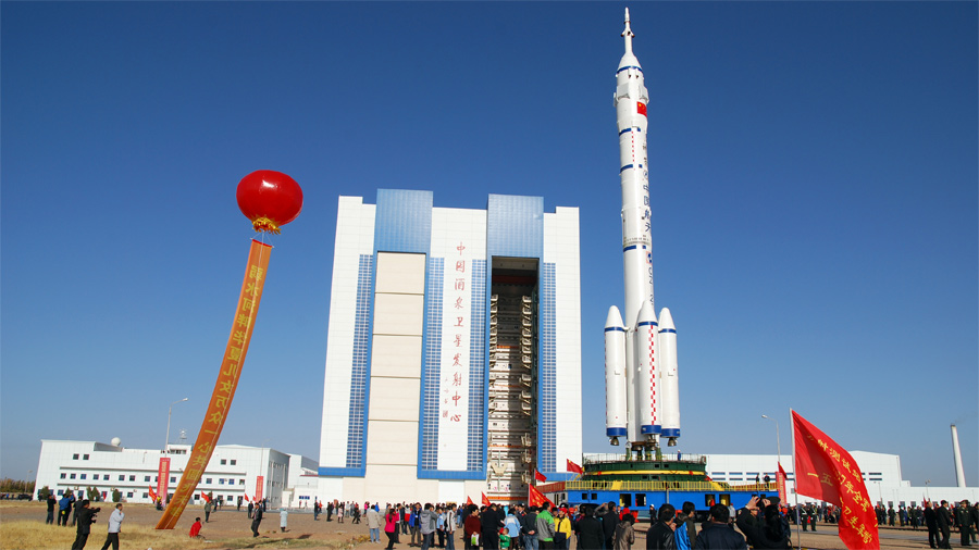 The Chinese Long March 2F rocket due to carry the Shenzhou 8 spacecraft to orbit in November 2011 rolls to the launch pad in Mongolia.