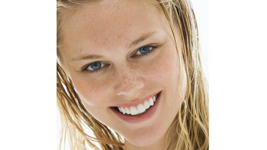 woman with fresh skin smiling