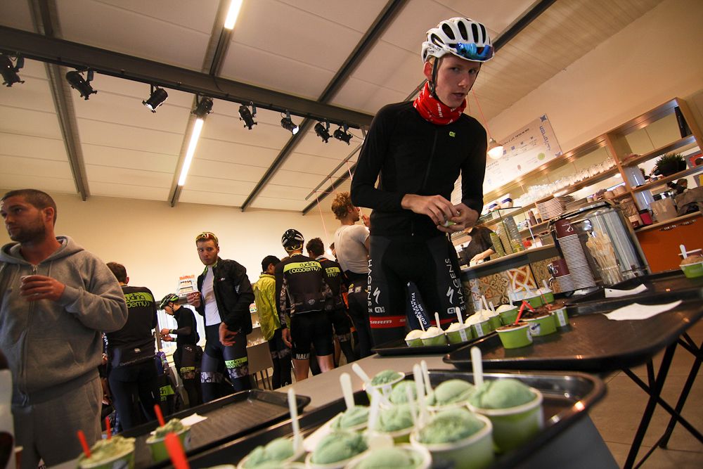 Krists Nielands tries some ice cream samples during a break in the ride.