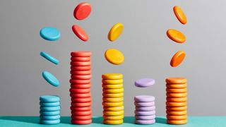 Piles of wooden coins of different colours