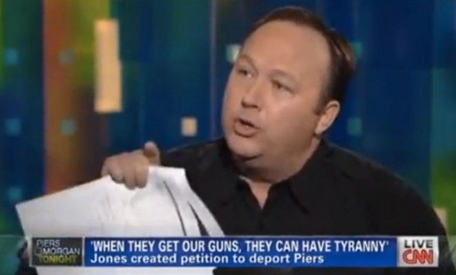 Alex Jones seen on CNN with Piers Morgan.