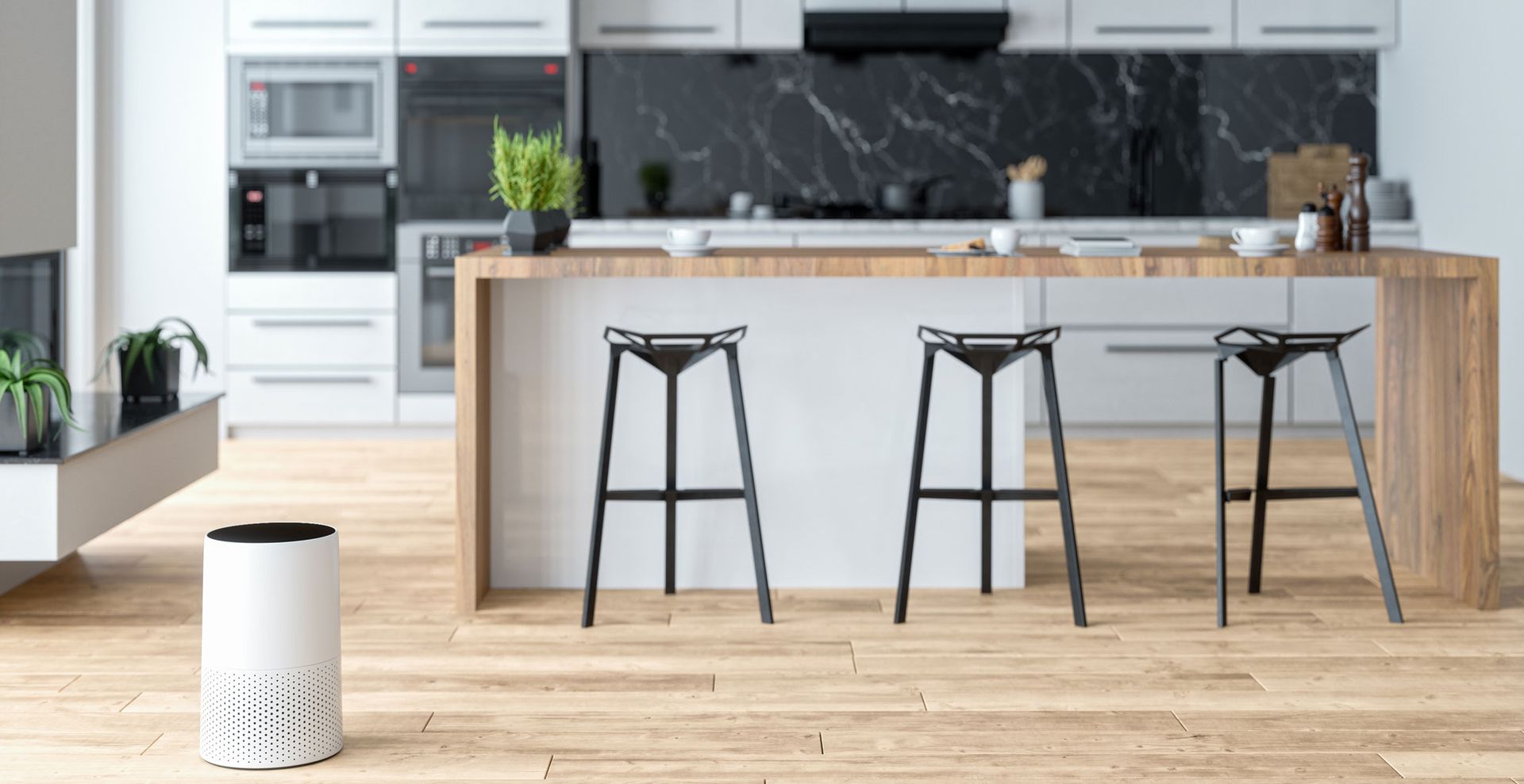 Contemporary kitchen with island seating an an air purifier on the wooden floor the other side to show how to get rid of dust with ease