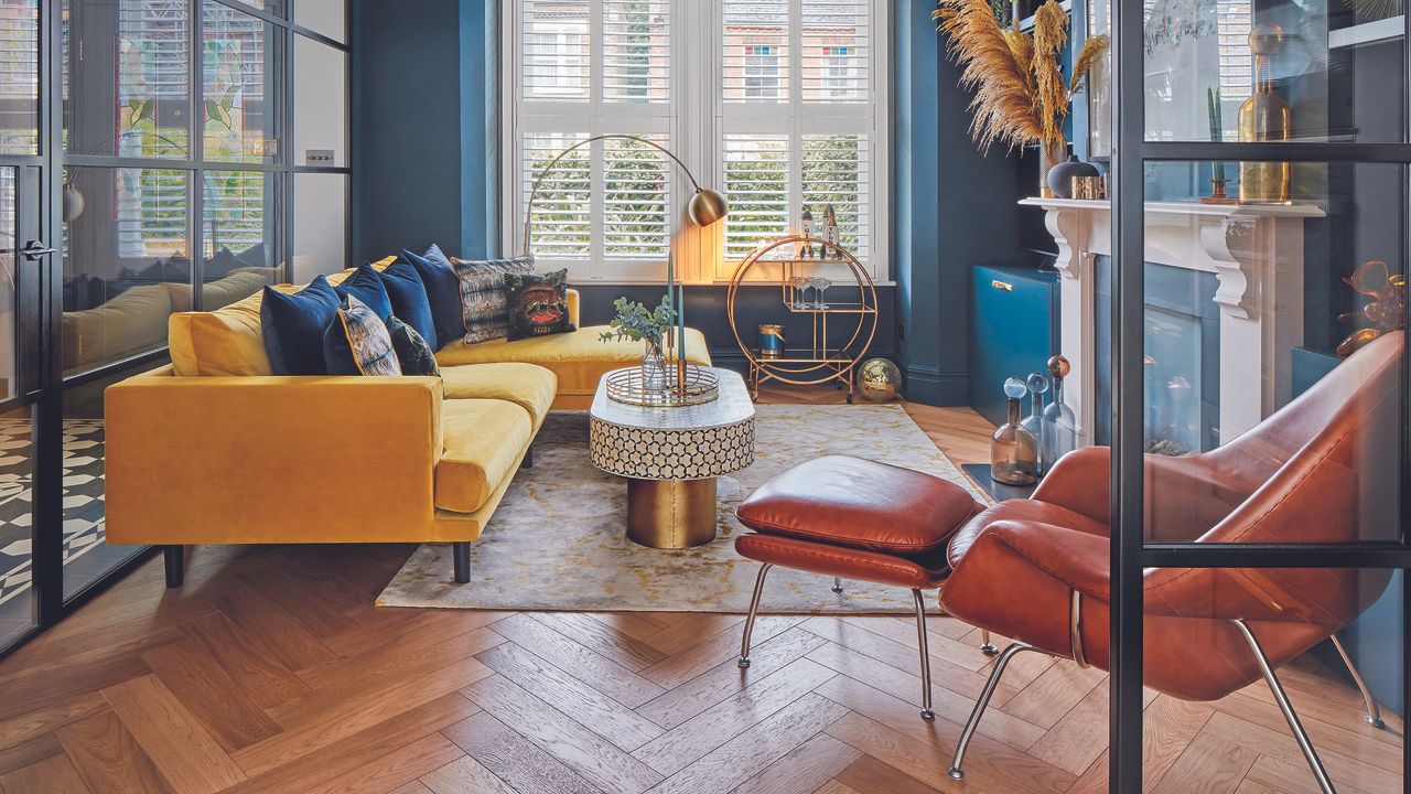 Living room with sofa and leather armchair