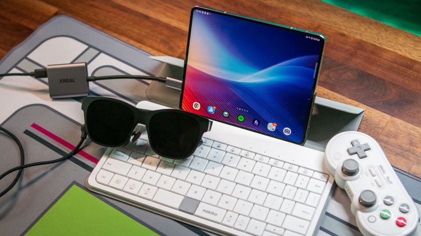 Desk setup with Xreal Air 2, Galaxy Z Fold 5, and Mokibo keyboard