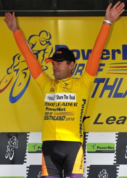 Jeremy Yates (Share The Road) in yellow on the podium.