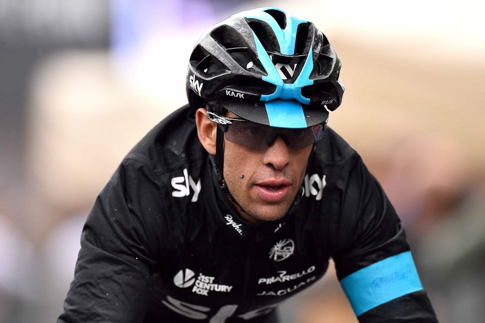 Richie Porte finishes in the rain.