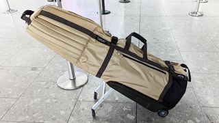 Sun Mountain Club Glider Meridian Travel Cover pictured at an airport