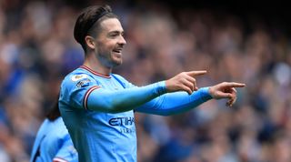 Jack Grealish of Manchester City celebrates after scoring his team's fourth goal during the Premier League match between Manchester City and Liverpool at the Etihad Stadium on April 1, 2023 in Manchester, United Kingdom.