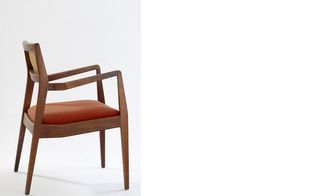 Brown wooden armchair