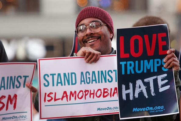 Protesters take a stand against Donald Trump.