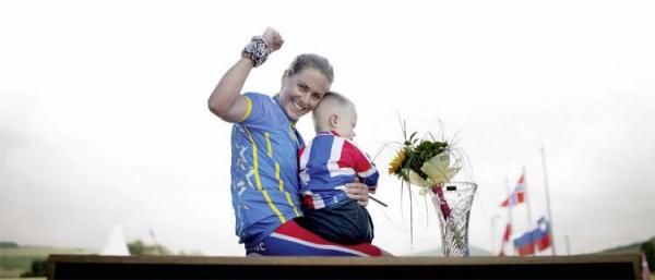 Gunn-Rita Dahle Flesj&aring; and her son Bjornar after she won the 2011 European championships.