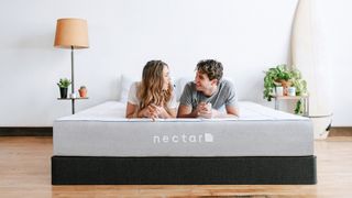Black Friday mattress deals: A couple lie on a Nectar mattress