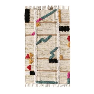 A rectangular beige rug with multicolored decorations
