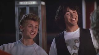 Alex Winter and Keanu Reeves smiling together in Bill and Ted's Excellent Adventure.