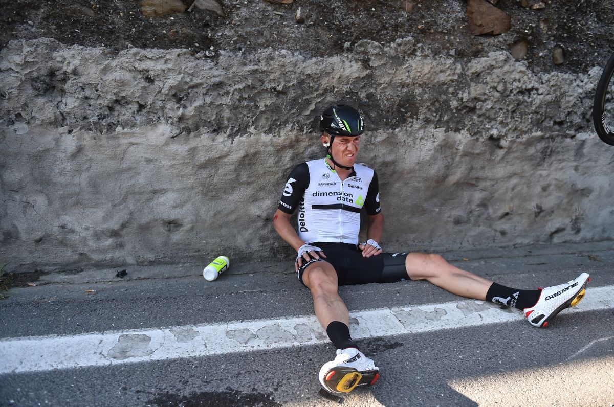Serge Pauwels (Dimension Data) finds himself in the gutter after a late crash