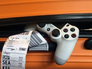 PS4 controller in luggage