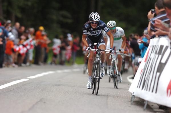 Frank Schleck (Saxo Bank) stomps past Roche to take the stage win.