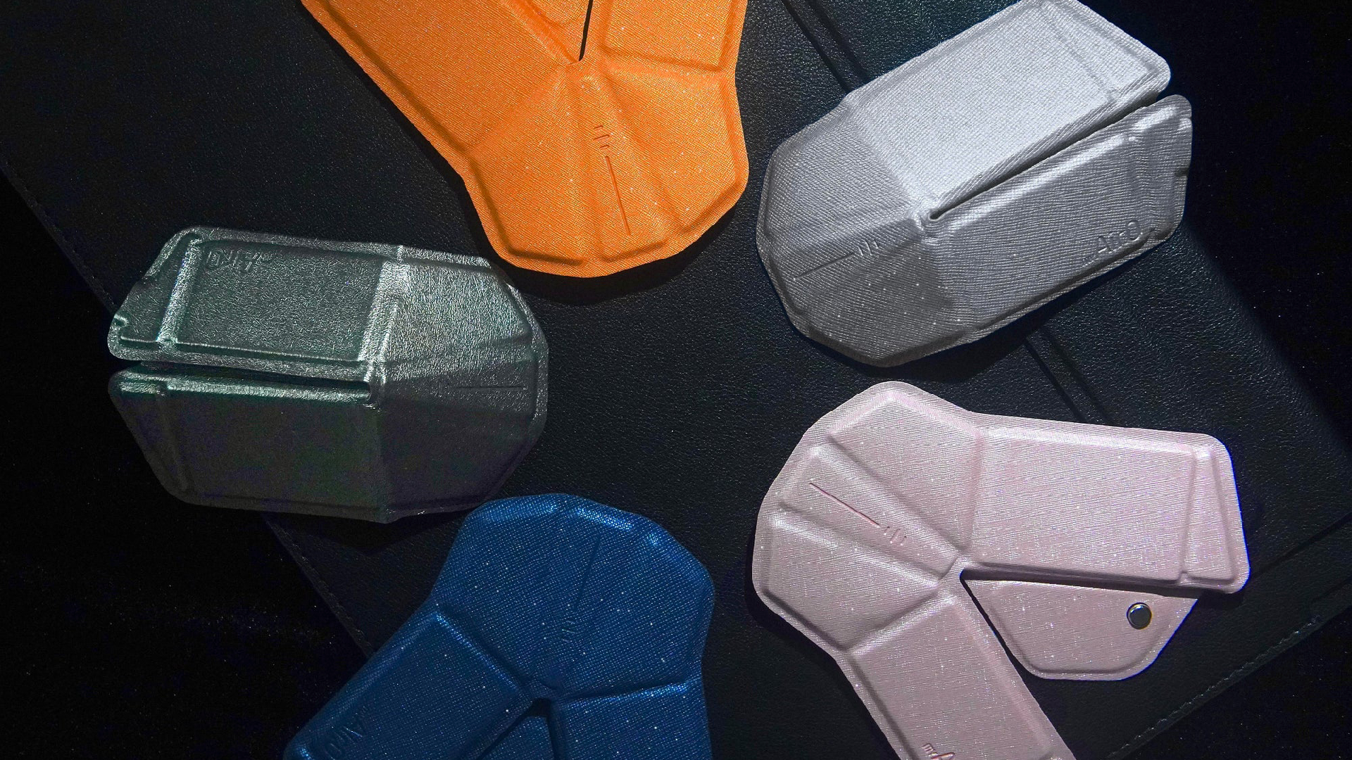 A selection of myAir.0 OriMeeses, in different colorways and spread out in a circle