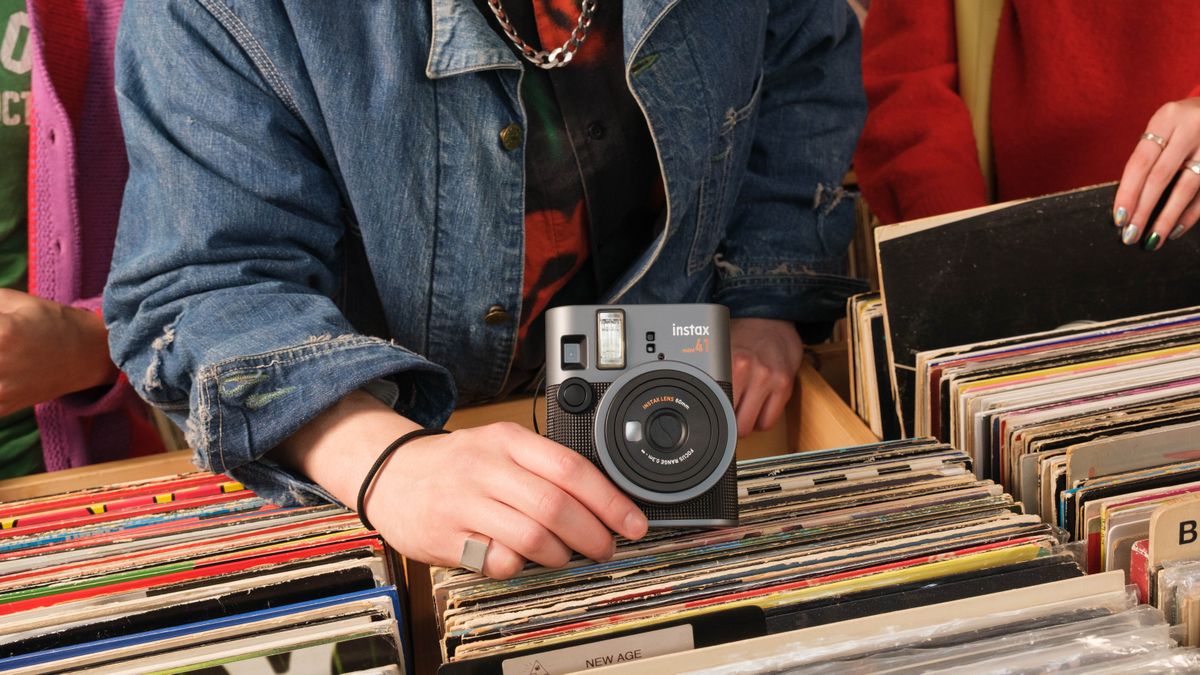 Fujifilm Instax Mini 41 being used in a record store