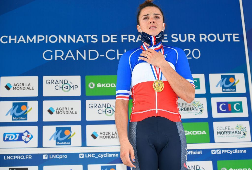 Gold medalist Audrey CordonRagot sings the national anthem during the podium ceremony after winning the French Elite women road cycling championship in Grand Champ western France on August 22 2020 Photo by Damien MEYER AFP Photo by DAMIEN MEYERAFP via Getty Images