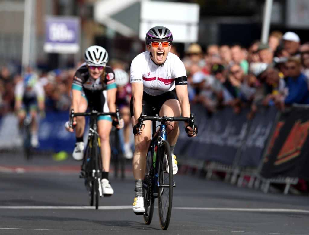 Sophie Mackay celebrates winning the elite women's national criterium
