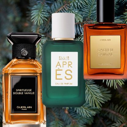 evergreen background with two amber perfume bottles and one green perfume bottle