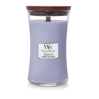 lavender scented candle in hourglass clear glass vessel