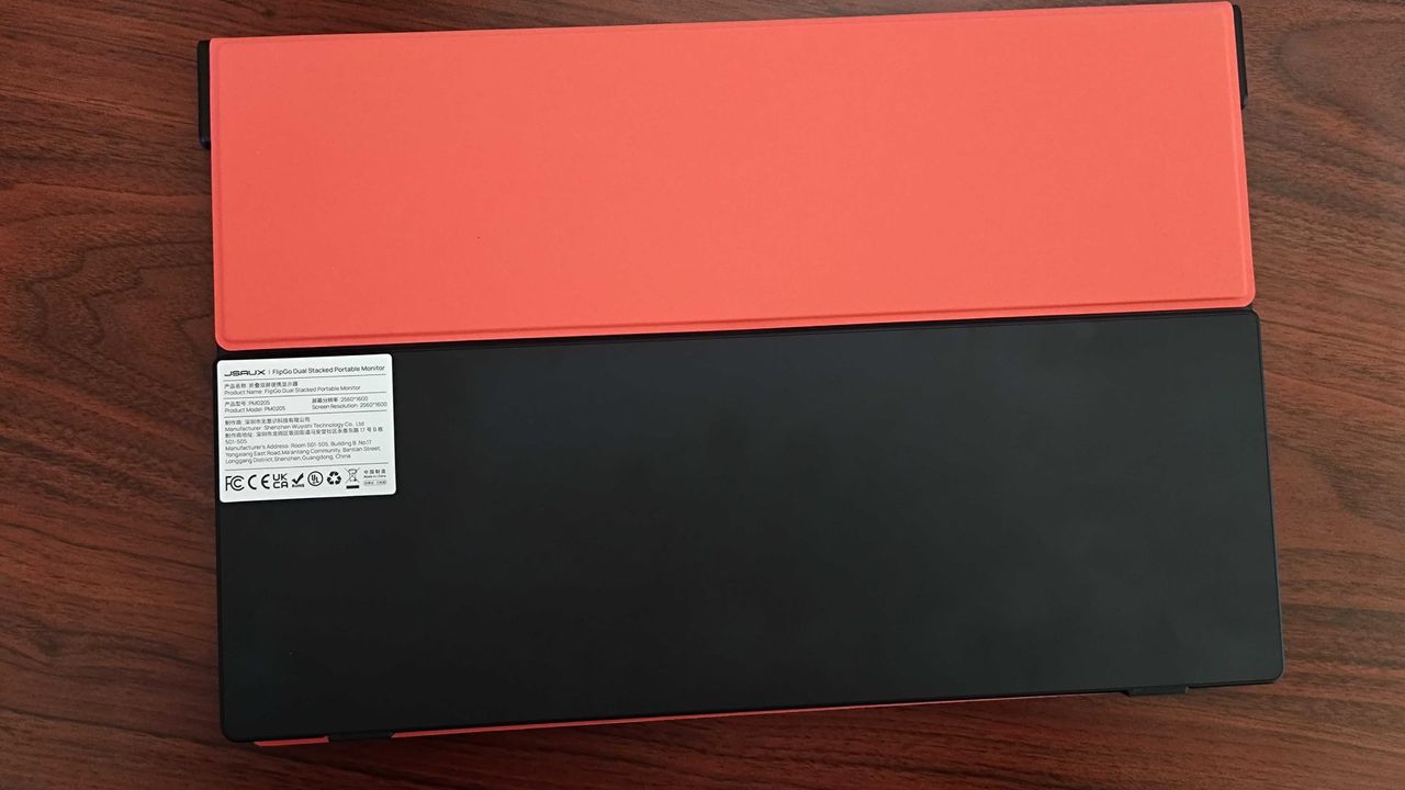 Back of Jsaux FlipGo lying face down with orange cover attached