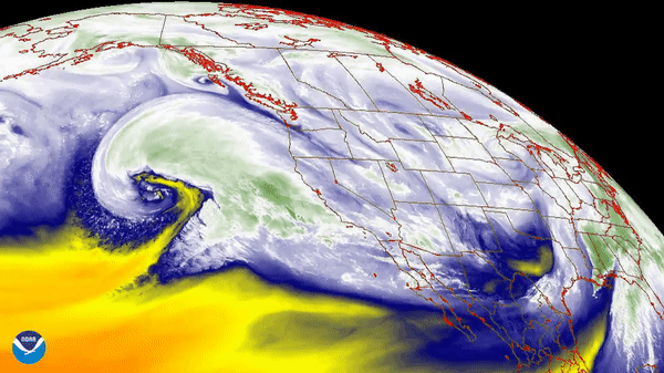 Water vapour imagery by NOAA's GOES West satellite shows a powerful atmospheric river funeling moisture from Hawai'i to California.