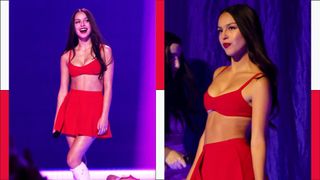 Olivia Rodrigo on stage at the 2023 VMAs wearing a red co-ord outfit
