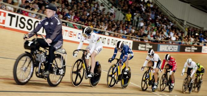 Becky James leads out the Keirin behind the Derny to a sell out crowd