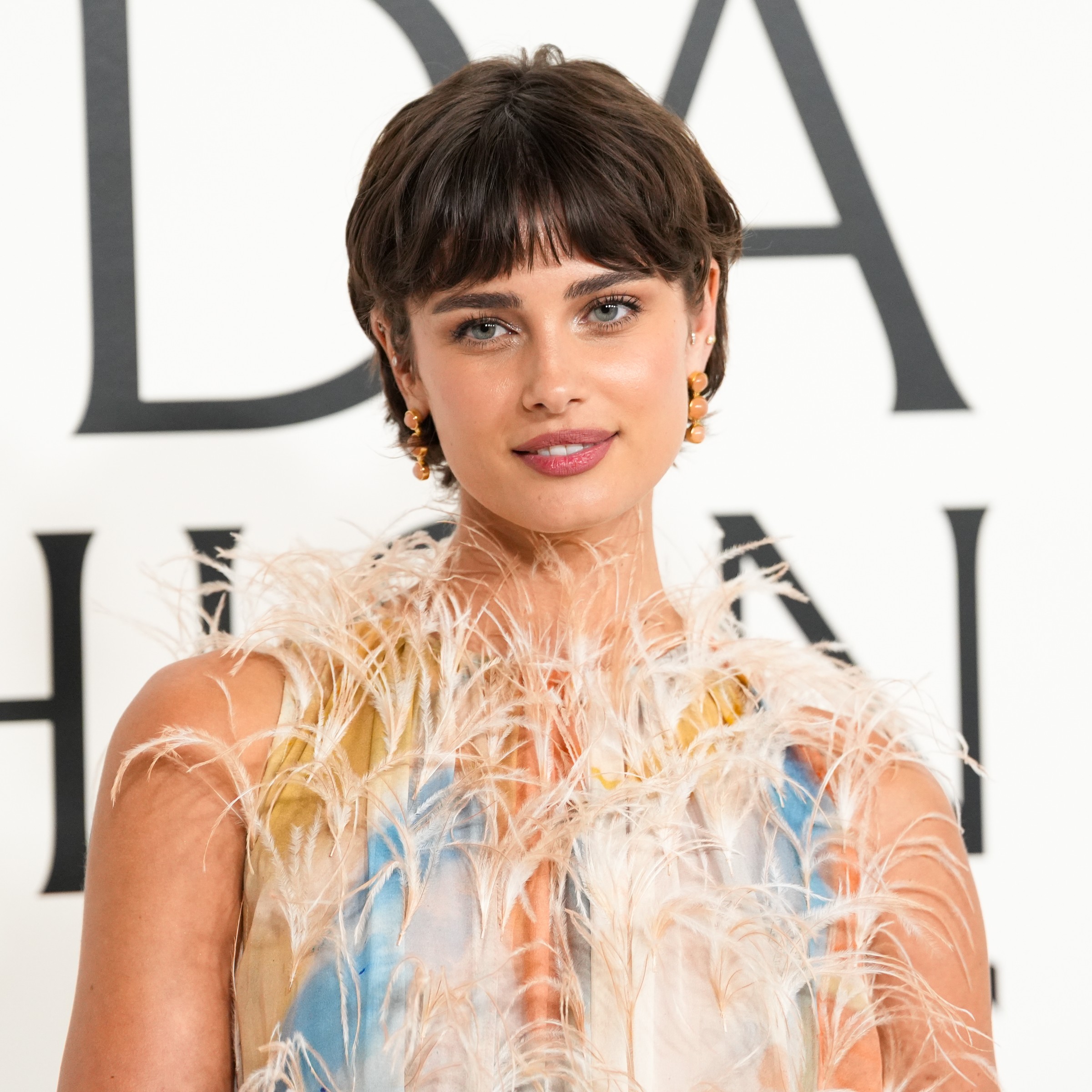 Taylor Hill showing off a micro bang hairstyle.