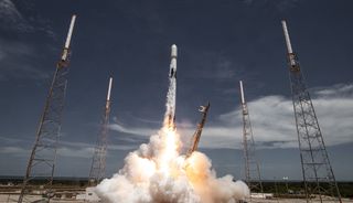 A SpaceX Falcon 9 rocket launches 52 Starlink satellites from Launch Complex 39A at NASA's Kennedy Space Center in Florida, on May 26, 2021.