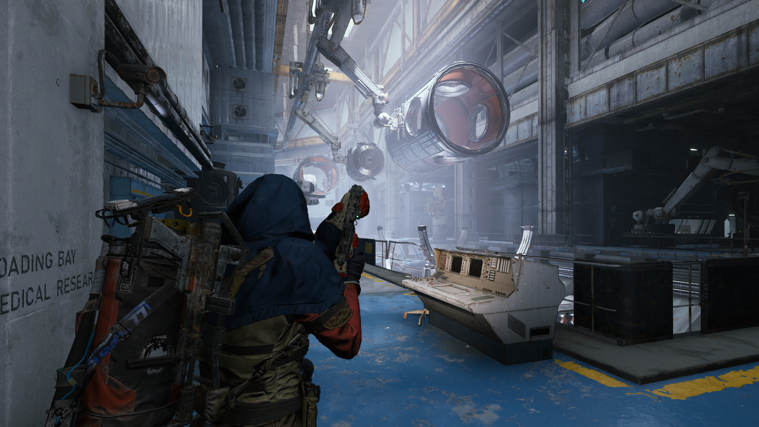 Arc Raiders Geiger Counter: A player looking at the Assembly production line in Stella Montis.