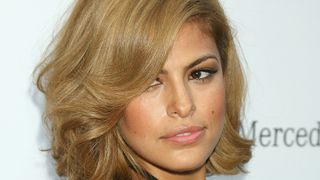 eva mendes on the red carpet with a short haircut