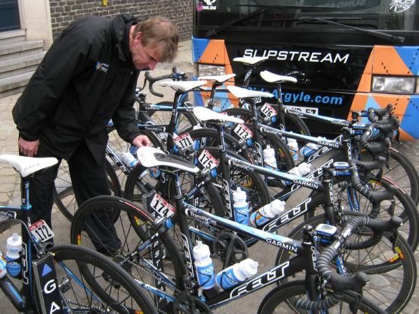 A member of the Garmin-Transition staff checks the Felt bikes