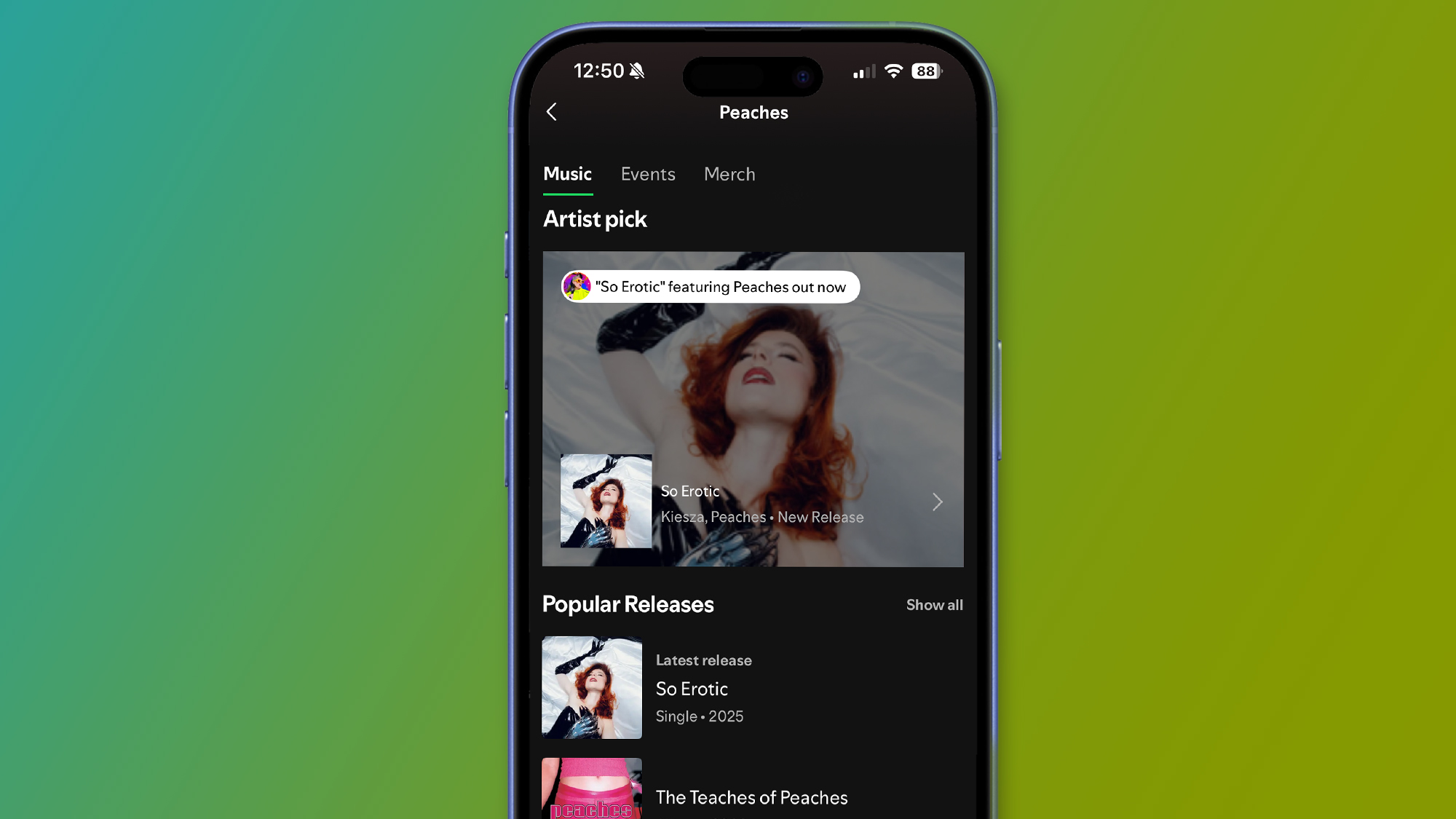 A phone on a green background showing a Peaches album on Spotify