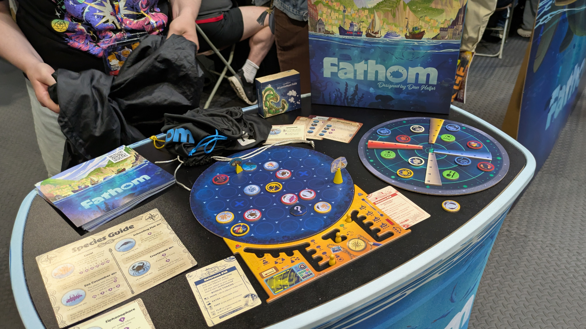 Fathom box, board, and components on a table